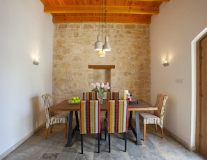 Microwave, oven, stovetop, dining tables
