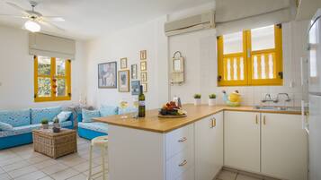 Microwave, oven, stovetop, dining tables