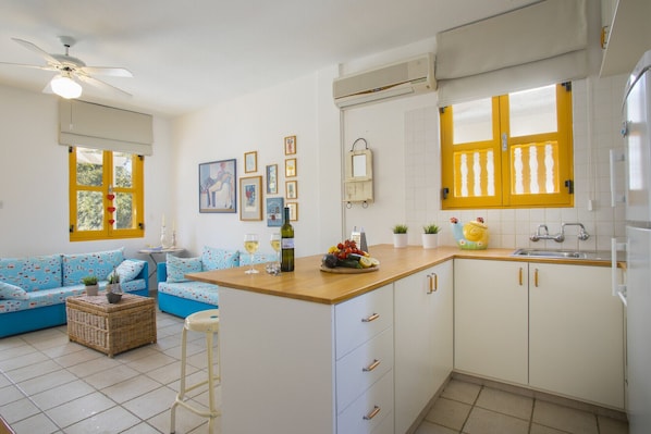 Microwave, oven, stovetop, dining tables