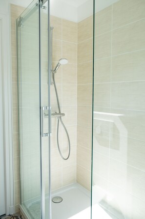 Hair dryer, towels, soap, shampoo