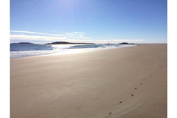 Una playa cerca, toallas de playa