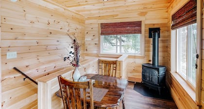Charming riverfront home with mountain views & private dock