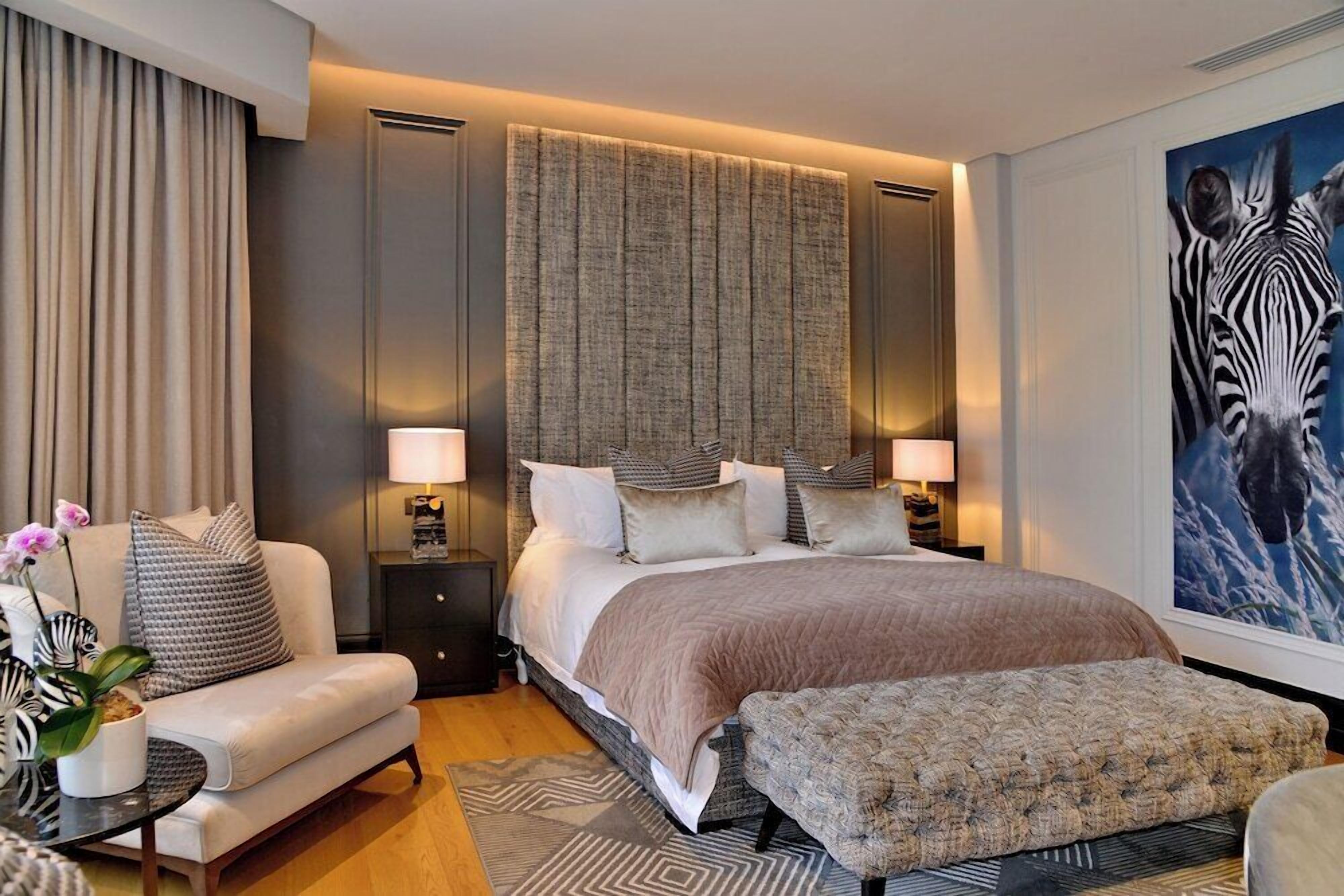 Premium bedding, down comforters, pillowtop beds, minibar