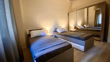 3 habitaciones, tabla de planchar con plancha, wifi y ropa de cama