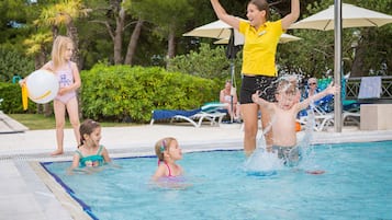 Seasonal outdoor pool, open 7:00 AM to 8:00 PM, pool umbrellas