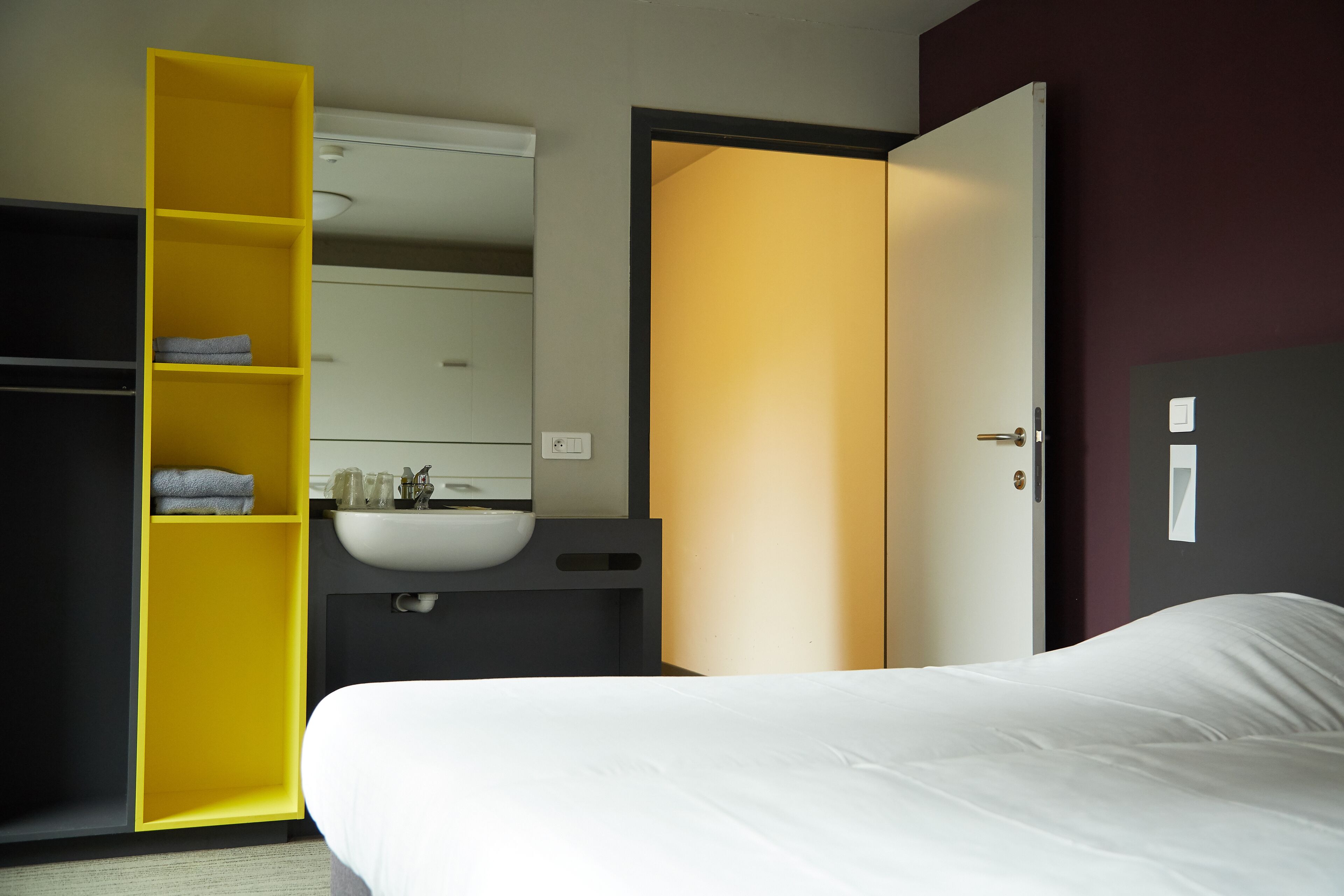 Premium bedding, blackout curtains, iron/ironing board, free WiFi