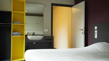 Premium bedding, blackout curtains, iron/ironing board, free WiFi