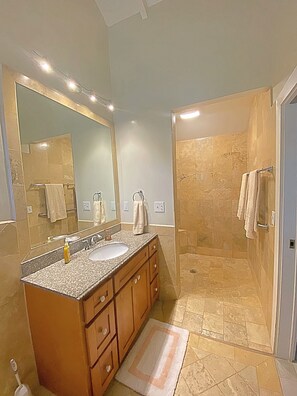 Shower, hair dryer, towels, soap