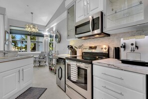 Coffee/tea maker, fridge, microwave, oven