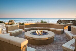Relax and socialize in this tranquil outdoor space with a fire pit and ocean views.