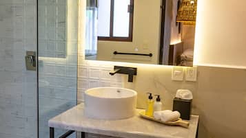 Bathtub, towels, soap, toilet paper
