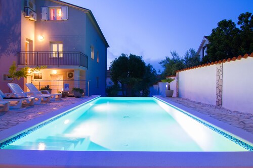 Apartment Aquamarin with heated pool and garden