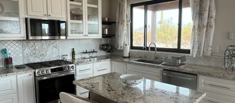 home backs to the state park, heated saltwater pool and jacuzzi