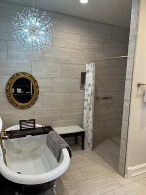 Combined shower/tub, hair dryer, towels, soap