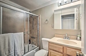 Combined shower/bathtub, hair dryer, towels, soap