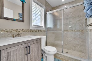 Shower, towels, soap, toilet paper