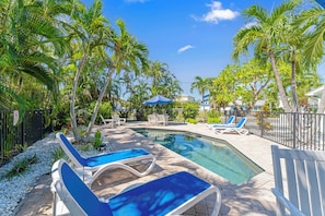 Outdoor pool, a heated pool - BEST LOCATION! NORTH END OF ANNA MARIA, FL , STEPS TO BEACH & DINING , UNIT B (Anna Maria)