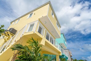 Exterior - Yellow 3 Story Home (Key Largo)