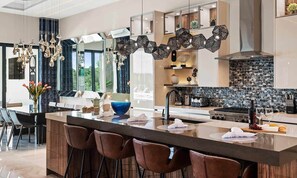 Fridge, microwave, oven, stovetop - Luxurious Mansion with Infinity Pool at Reunion (Kissimmee)