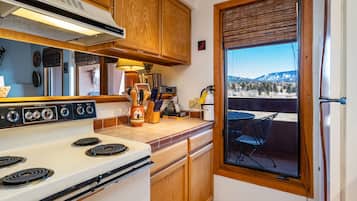 Condo, Multiple Beds, Balcony, Mountain View (#305 - Pet Friendly) | Private kitchen | Fridge, microwave, oven, stovetop