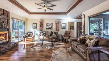 Cabin, 3 Bedrooms | Living area | TV, fireplace