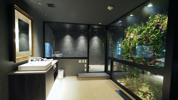 A modern bathroom with a large window, a sink, and a mirror. - Pres De La Mer (Hakodate)