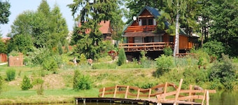 Rustic Riverside Cabin in Forest