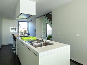 House | Private kitchen | Microwave, high chair, cookware/dishes/utensils - Modern Holiday Home Near Bruges and the North Sea (Bruges)