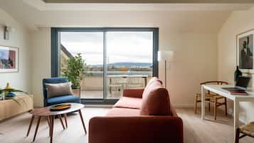 Penthouse, 2 Bedrooms, Terrace | Living area | 40-inch TV with digital channels