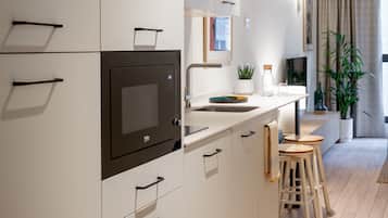 Estudio | Cocina privada | Parrilla de estufa y utensilios de cocina