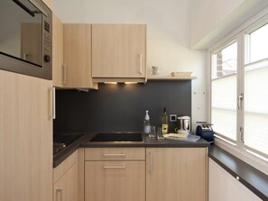 Coffee/tea maker, fridge, microwave, dishwasher