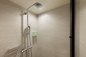A modern shower with a handheld showerhead and a wall-mounted control panel. - Fairfield by Marriott Kyoto Amanohashidate (Miyazu)