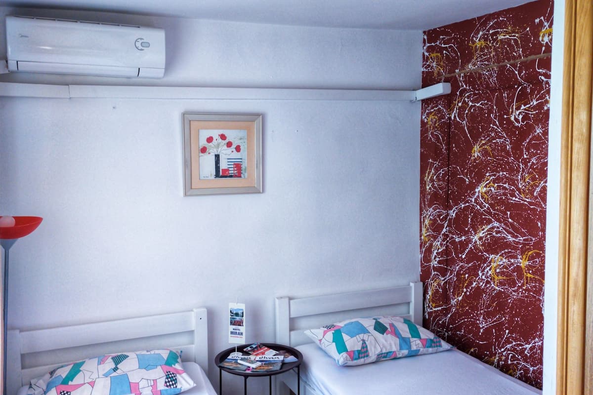 Twin Room | Blackout curtains, iron/ironing board, free WiFi, bed sheets