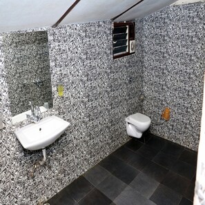 Habitación familiar | Lavabo en el baño