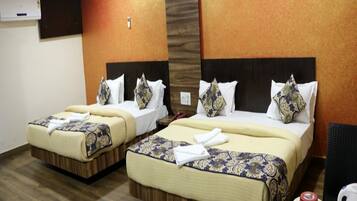 Family Room | Iron/ironing board, bed sheets