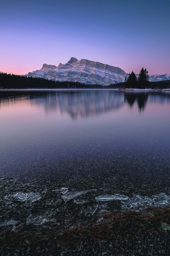 Mount Rundle reflected in the calm waters of Two Jack Lake.
- Rundleview - Impeccable Design and Private Hot Tub (Canmore)