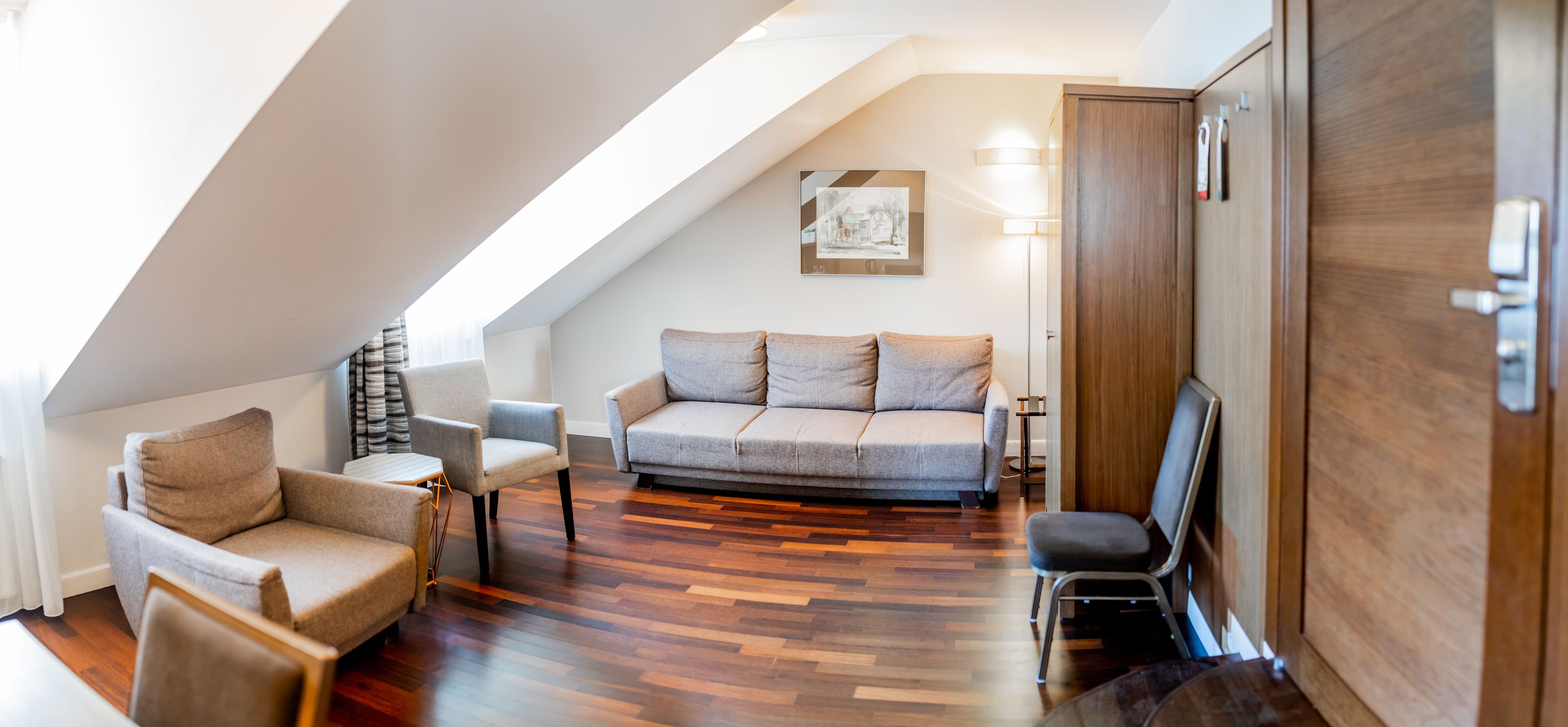 business suite | living area | flat-screen tv