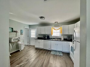 Fridge, microwave, oven, stovetop - Beach & Sunset views Cottage!! Close to Downtown (Gulfport)