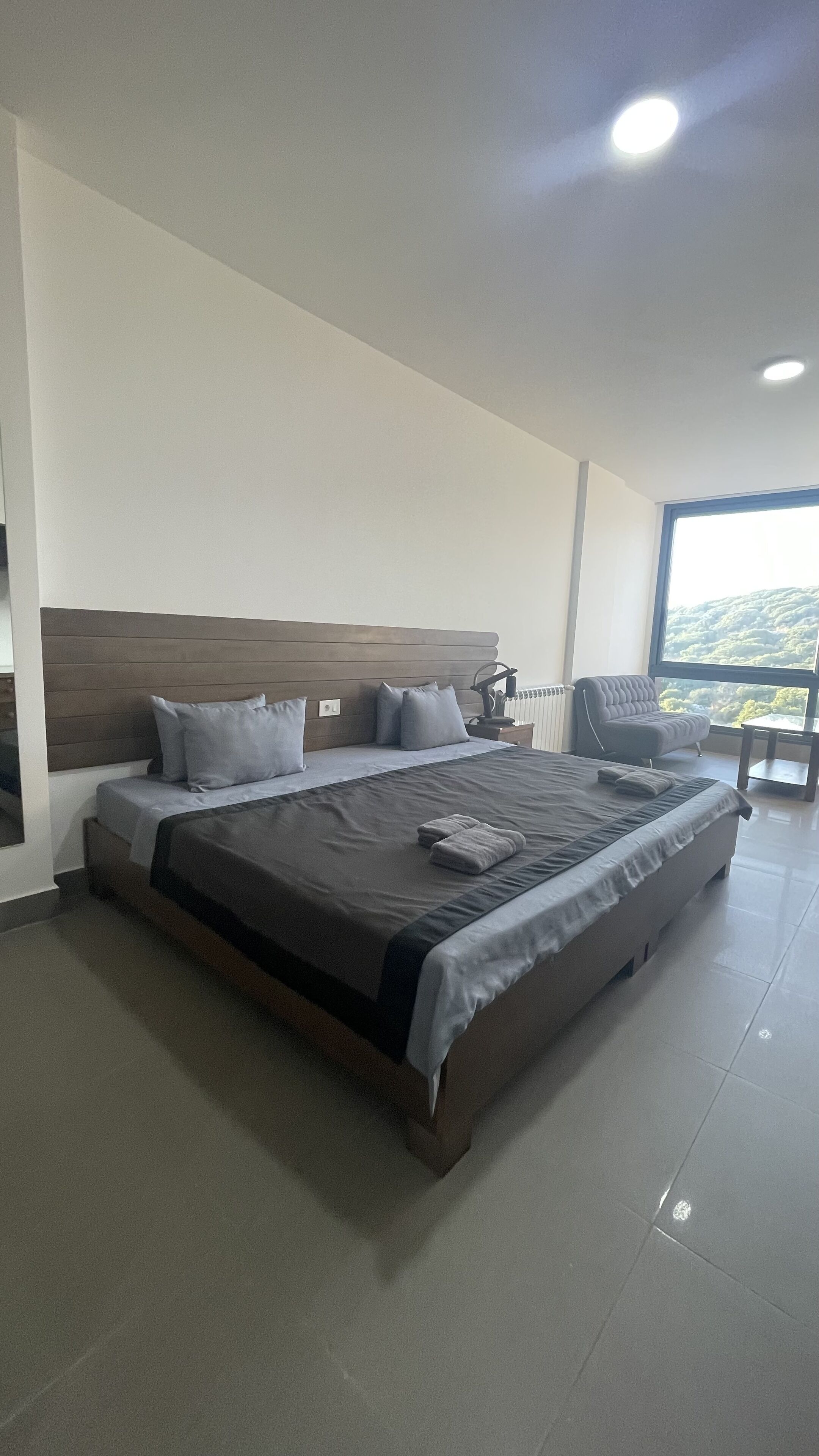 Premium bedding, desk, laptop workspace, free WiFi