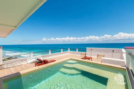 Outdoor pool, a rooftop pool. Casa Perla Suite 3 : Oceanfront Studio with Rooftop Dipping Pool