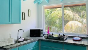 Signature Double Room | Private kitchen | Fridge, microwave, high chair, cookware/dishes/utensils - OSoleil Guesthouse (La Digue)