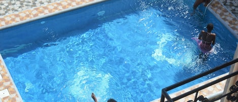Outdoor pool, sun loungers