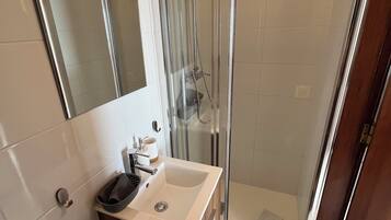 Hair dryer, towels, toilet paper