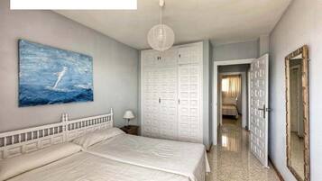 2 dormitorios, tabla de planchar con plancha, wifi gratis y ropa de cama