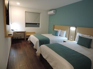 Habitacion Ejecutiva, 2 camas de matrimonio | 1 slaapkamer, luxe beddengoed, donzen dekbedden, een kluis op de kamer