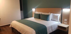 Habitacion Ejecutiva 1 cama de matrimonio grande | Ropa de cama de alta calidad y edredón