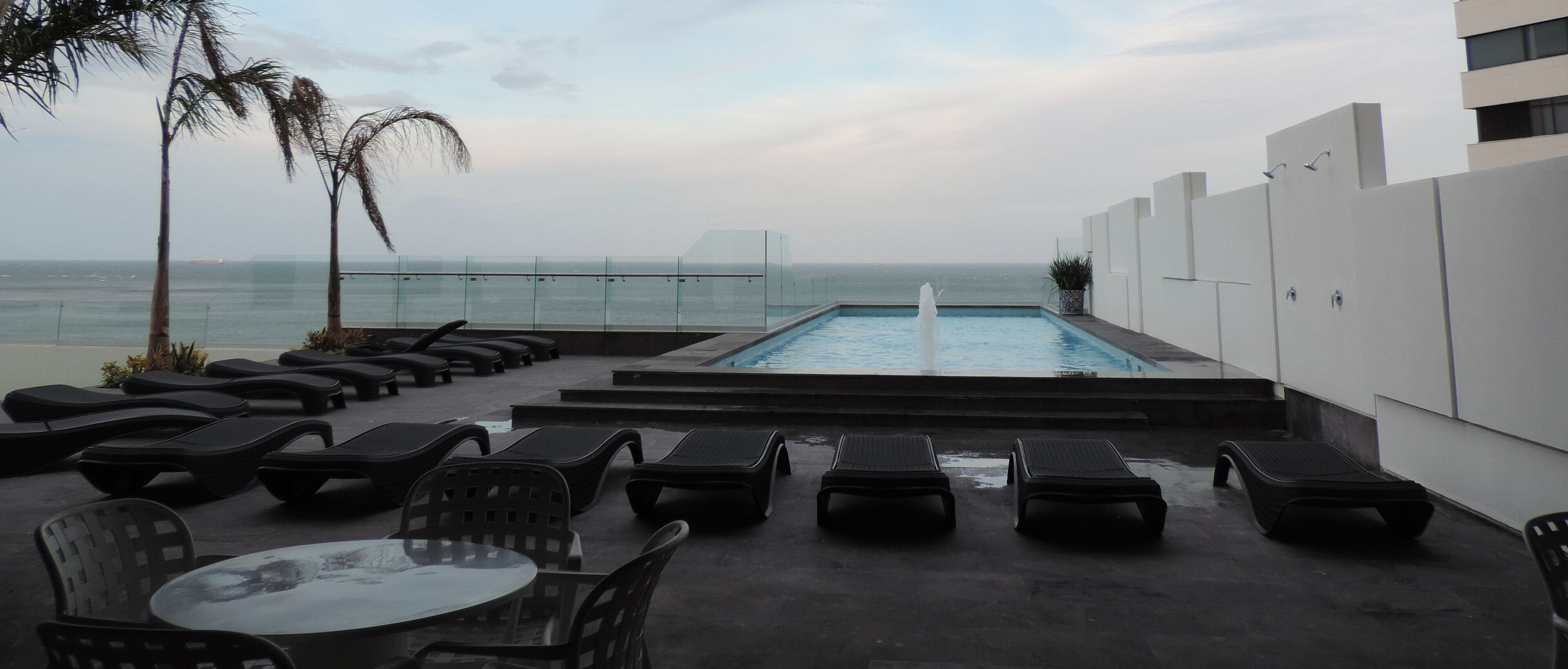 outdoor pool, open 9:00 am to 10:00 pm, pool loungers