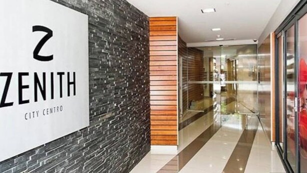 A modern interior with a sign reading '2 ZENITH CITY CENTER.' - Central CBD EXEC Stunning View Wifi Netflix Wine (Perth)