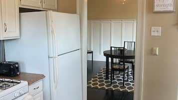 Apartment (Cozy, homey 1 bedroom home near Dormo) | Private kitchen | Fridge, microwave, coffee/tea maker, cookware/dishes/utensils