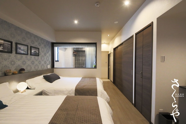 Desk, laptop workspace, free WiFi, bed sheets